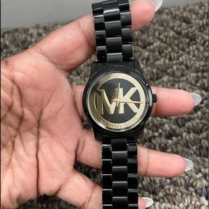 Black and Gold authentic Michael Kors watch